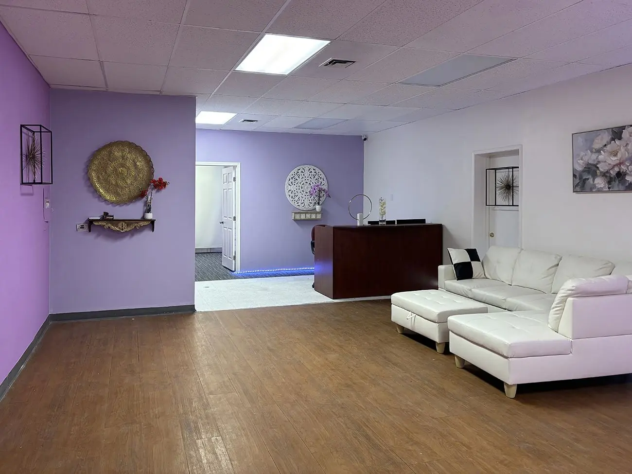 Real Desert Relax SPA lobby with gold medallion and white couch in Las Vegas